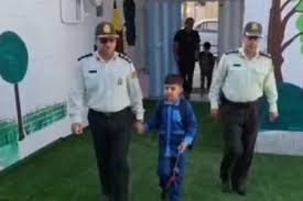 بدرقه فرزند شهید شکرزاده از خانه تا مدرسه